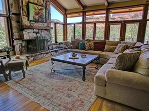 GREAT ROOM: Large living room with floor to ceiling windows provide super red rock views from the entire room.