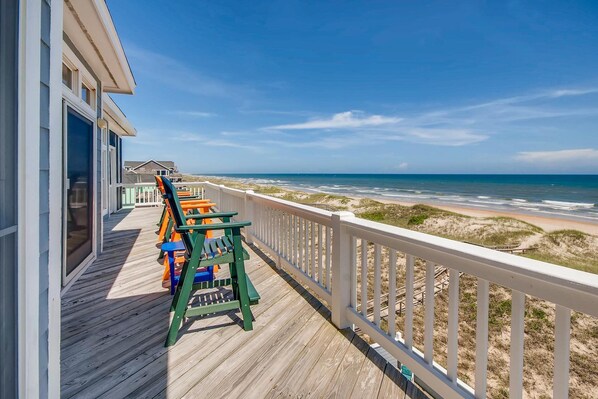 Soak in breathtaking ocean views from the expansive deck! This Hatteras Island vacation rental offers the perfect spot to relax and enjoy the coastal scenery.