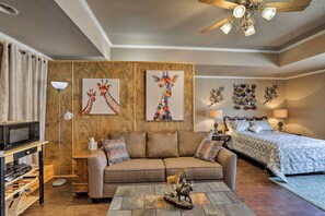 Studio | Living Area | Central A/C & Heating | 65" Flat-Screen TV | Free WiFi