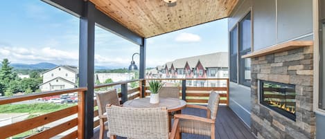 Deck seating to enjoy the fireplace and the amazing mountain views