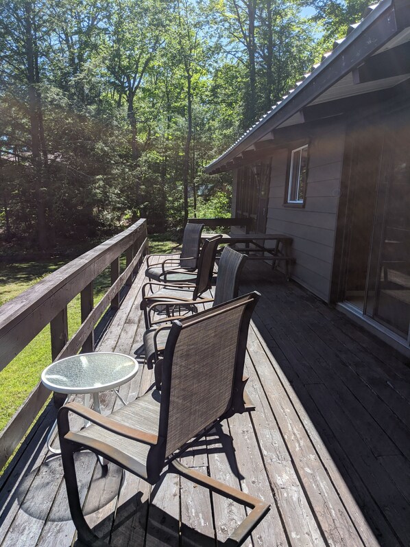 Sunny south facing deck with picnic table and bbq