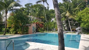 Infiniti Blu's tropical garden embraces a quiet, crystal clear swimming pool.