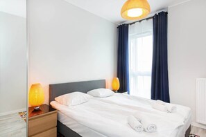 Comfortable double bed in the bedroom. 