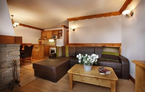 Sit back and relax in the cozy living area after a great day.