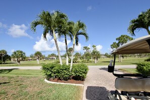 Front facing the 12th fairway. 