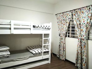 3rd room with 1 bunk bed and 1 put out