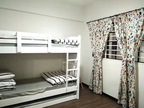 3rd room with 1 bunk bed and 1 put out