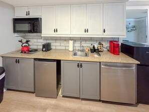 Galley kitchen with 2 fridges - 1 is mid sized