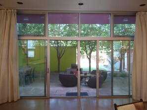 Sliding doors to create a beautiful indoor/outdoor space. 