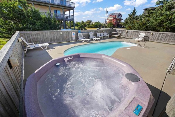 Enjoy a soothing soak in the 6-person hot tub or take a dip in the private swimming pool at Beyond the Sea.