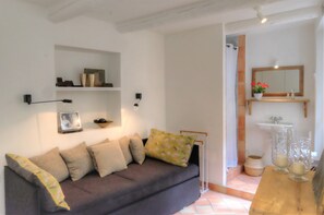 Small rest area where there is a sofa bed but too small to sleep a few days.