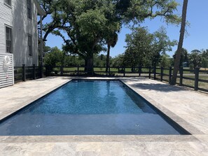 Pool now open!  New lounge chairs just installed (new pictures coming soon).  A total of eight units will share the pool.