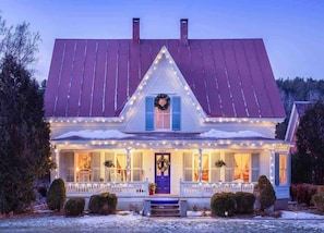 Our home at twilight in winter - we hear it looks like it belongs on the Hallmark channel a lot :)