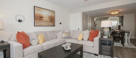 Courtside 42 - Newly renovated and updated. - The Living Room has designer furnishings and wood grain tile flooring.