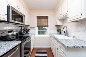 Kitchen is fully stocked with all necessary appliances and then some!