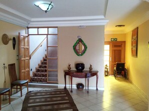 ASANTE GUEST HOUSE.
STAIRWAY TO TEN COMFORTABLE GUEST ROOMS AND LARGE BALCONY.