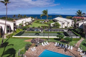 Two swimming pools and a tennis court walking distance to beach