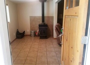 Front entry open to wood stove