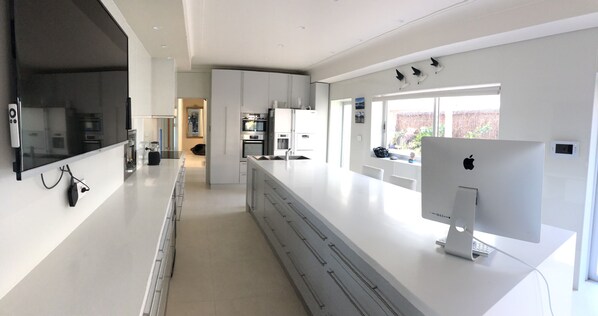 Large Modern Kitchen and outlook to AlFresca area