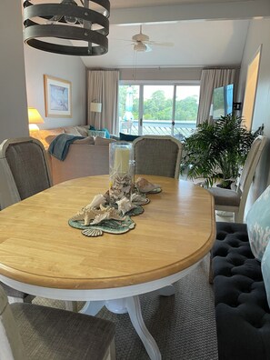 View of the living room and marsh from the dining area