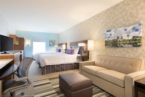 This spacious suite features comfy sofa bed, TV, wi-fi and a kitchenette