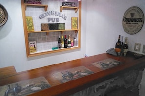 Lovely bar area perfect for entertaining guests especially during the big game! (Liquor not included)