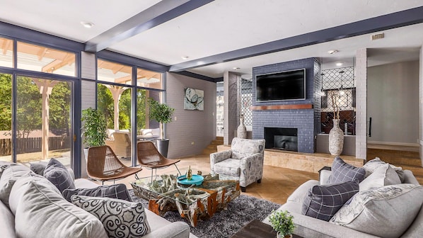 The gorgeous, sunken living space is perfect for entertaining!
