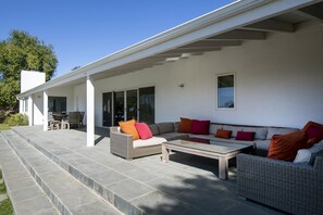 Great outdoor seating with view of the pool.