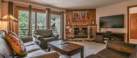 living room with a cozy fireplace