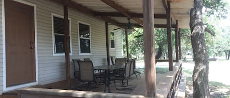 Covered deck area with picnic table