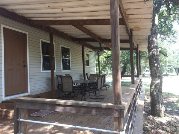 Covered deck area with picnic table