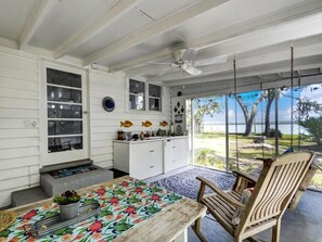 Cook Your Catch of the Day in the Outdoor Screened In Porch