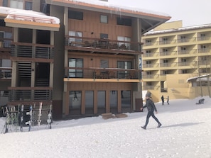 Two short stairs and you on the slopes. Next door is 9380 bar/rest. and rentals
