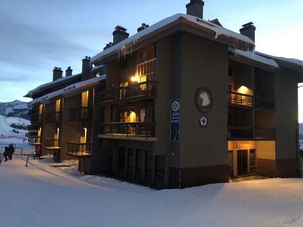 The first balcony slope side is your place!
