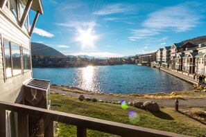 The private balcony features beautiful lake and mountain views.