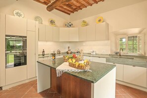 Kitchen, Interior Design, Countertop, Cabinetry, Flooring, Kitchen Appliance, Furniture, Ceiling, Major Appliance, Floor