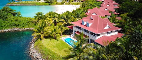 Villa 133 from the air - private, next to beach with snorkelling spot in front
