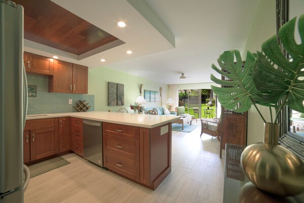 Brand new kitchen and appliances, quartz countertops and custom tiling.