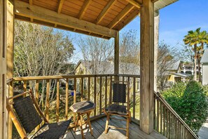 Private outdoor deck with seating to take in the beautiful Florida weather