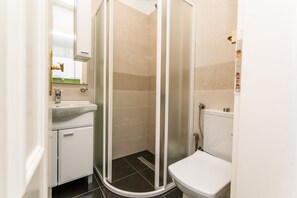 Our modern bathroom is equipped with fresh towels and toiletries for your convenience!