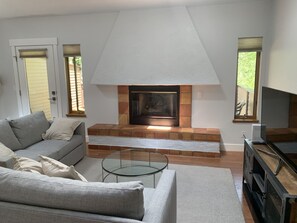Enjoy the family room with natural lighting provided by the skylights