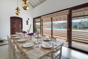 Dining area sits comfortably 10 guests