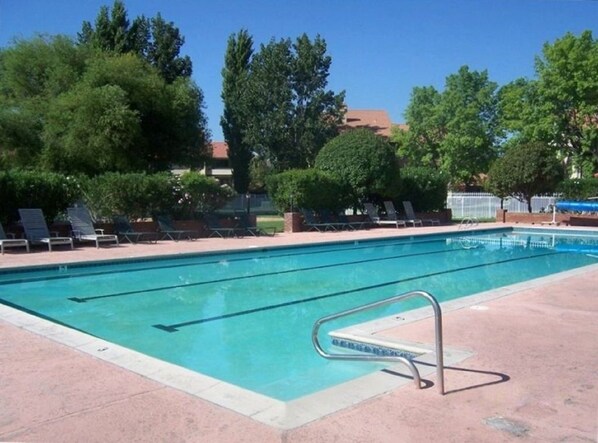 Welcoming large family pool with hot tub and separate toddler pool. 