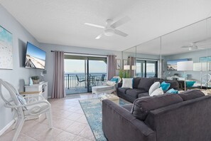 Living Room -  Balcony Access + Ocean Views