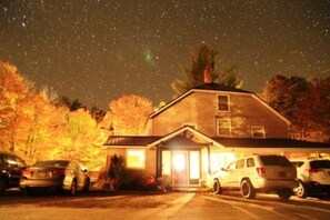 Oakview with stars in fall night sky.