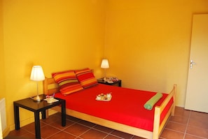 The bedroom features a cozy Double bed.