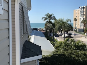 Gulf view from 3rd floor, trolley stop, and beach access with parking area.