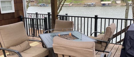 Covered patio area with propane fire pit