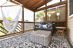 Screened-in porch is a great place to read emails or visit with loved ones.