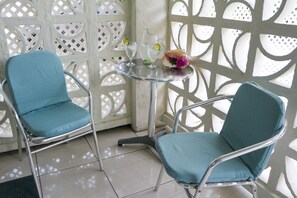 Covered patio - an ideal spot for morning coffee or evening cooler